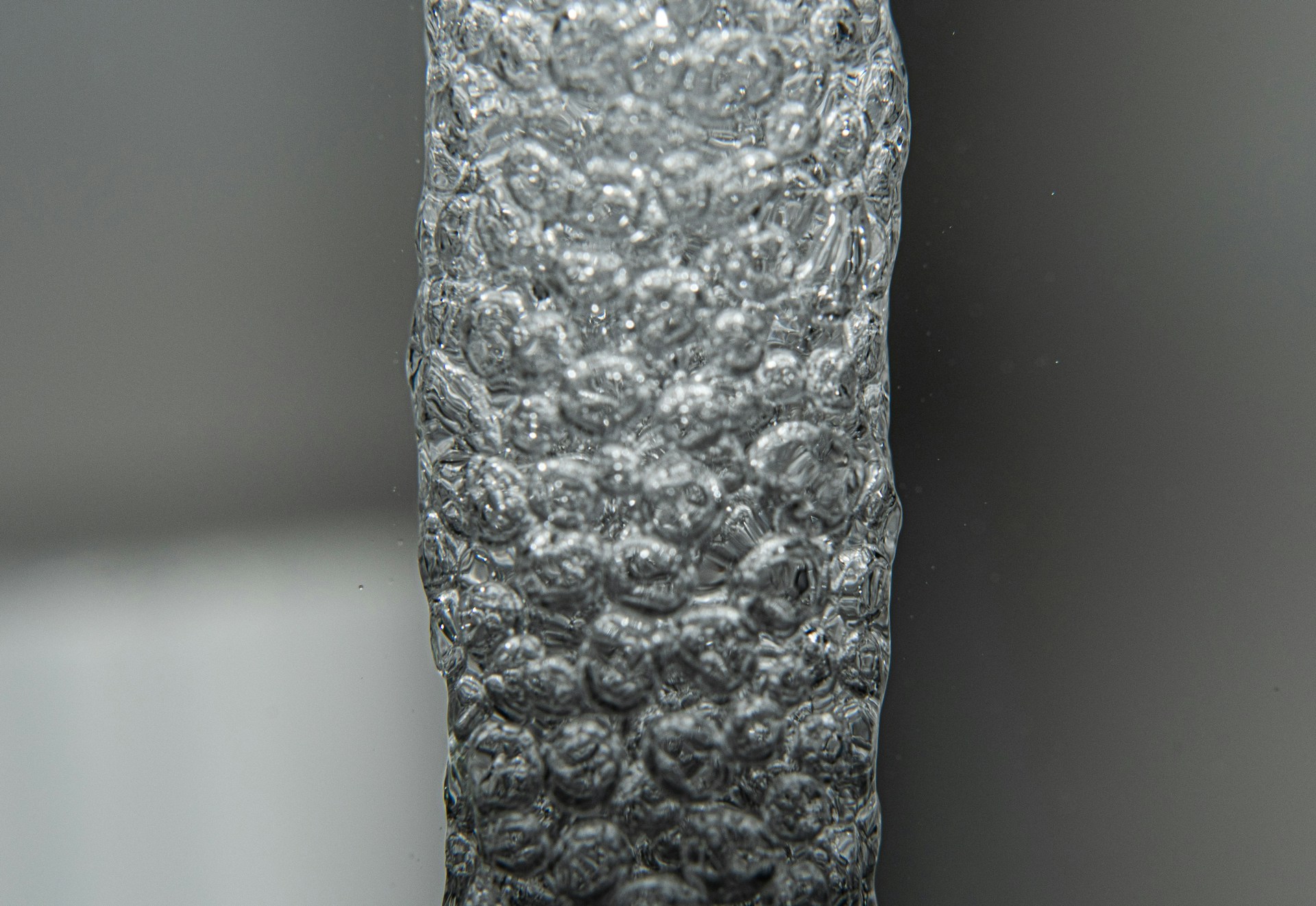 woman wearing yellow long-sleeved dress under white clouds and blue sky during daytime