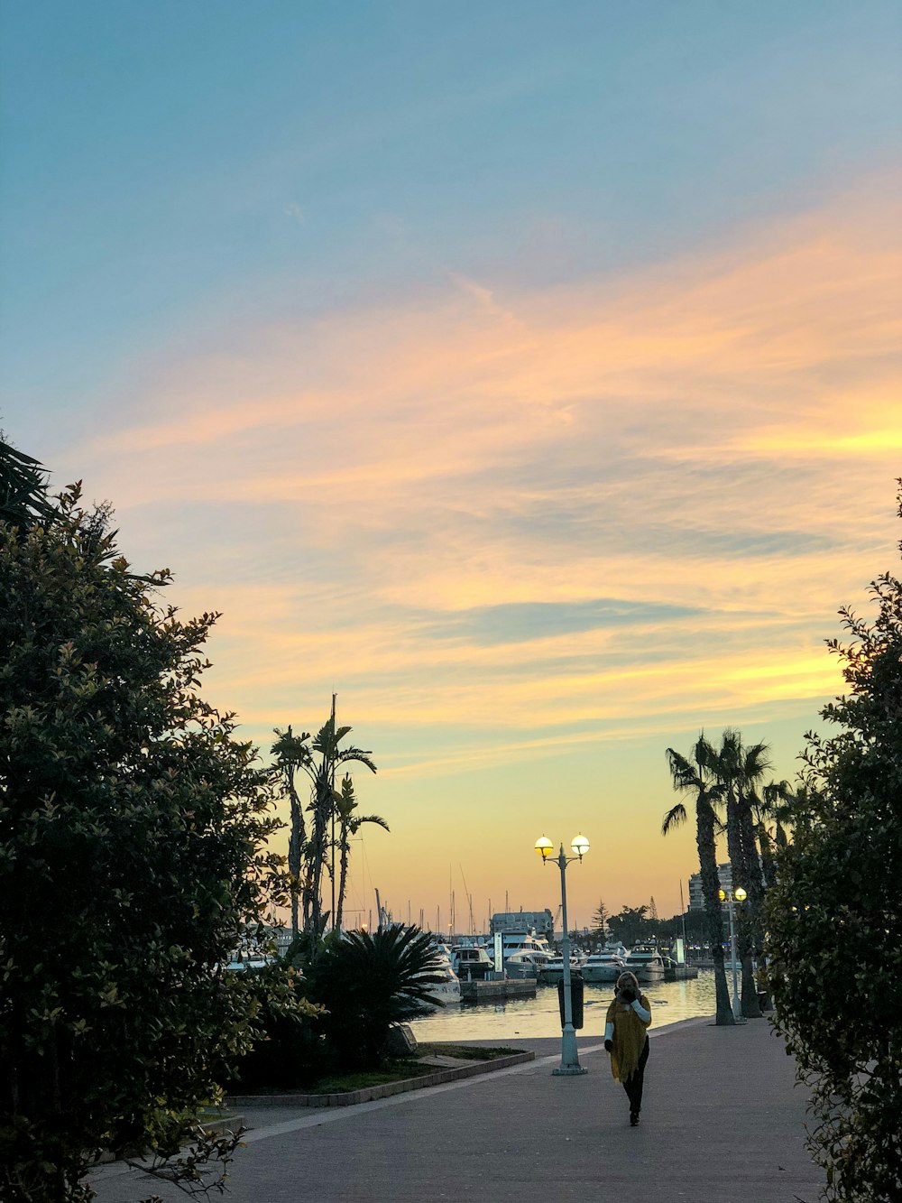 woman walking outside during sunset