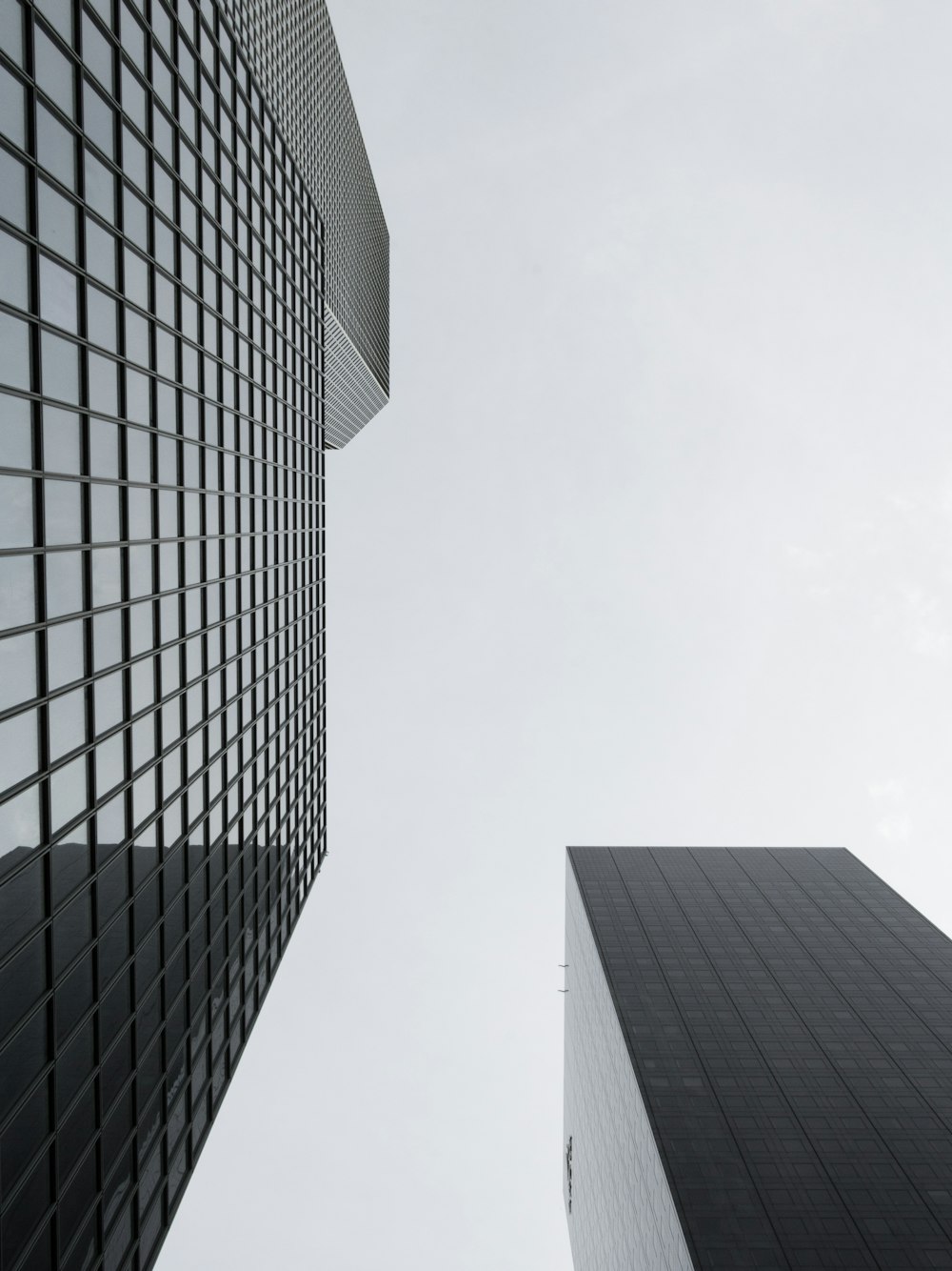 low angle photography of glass high rise building