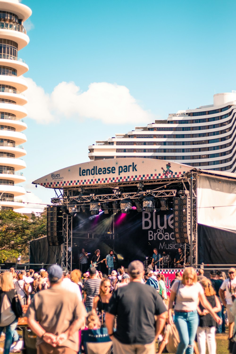 people at Lendlease park having concerts during daytime