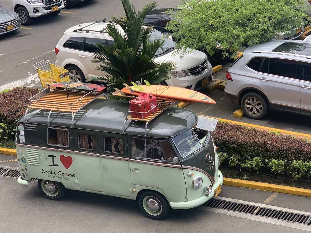 teal and black Volkswagen van