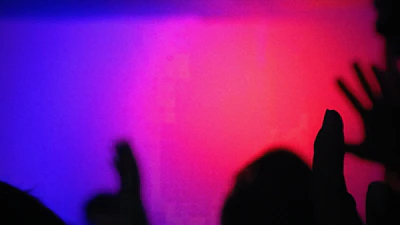 Abstract tech gradient background with silhouettes of diverse people chatting on devices.