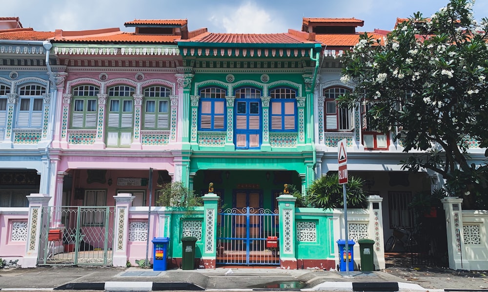 green and pink houses