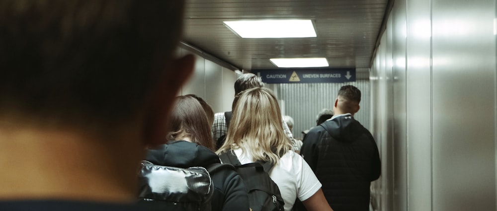 people standing inside building