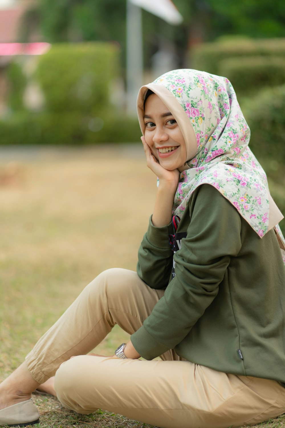 woman sitting on ground