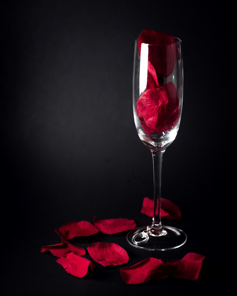 clear champagne flute with roses