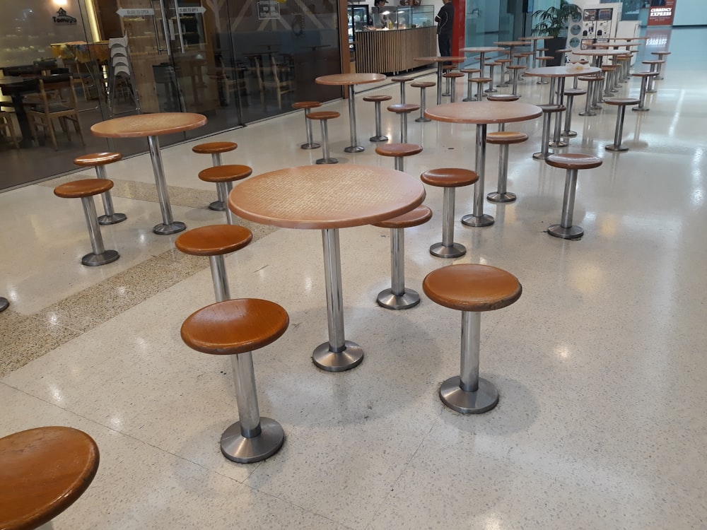 empty brown wooden stools and tables