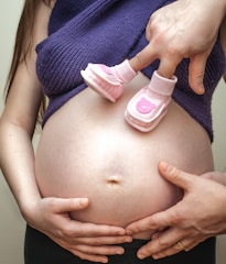 pregnant wearing blue dress
