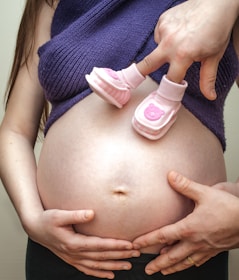 pregnant wearing blue dress