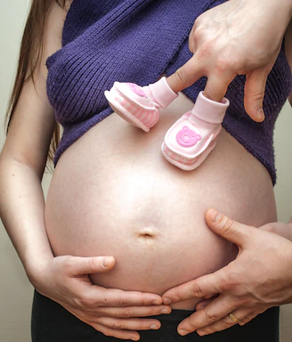 pregnant wearing blue dress