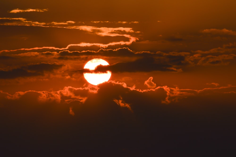 silhouette of clouds during golden hour