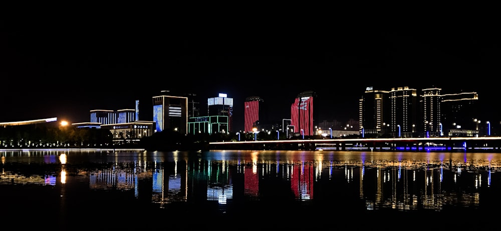 buildings beside body of water