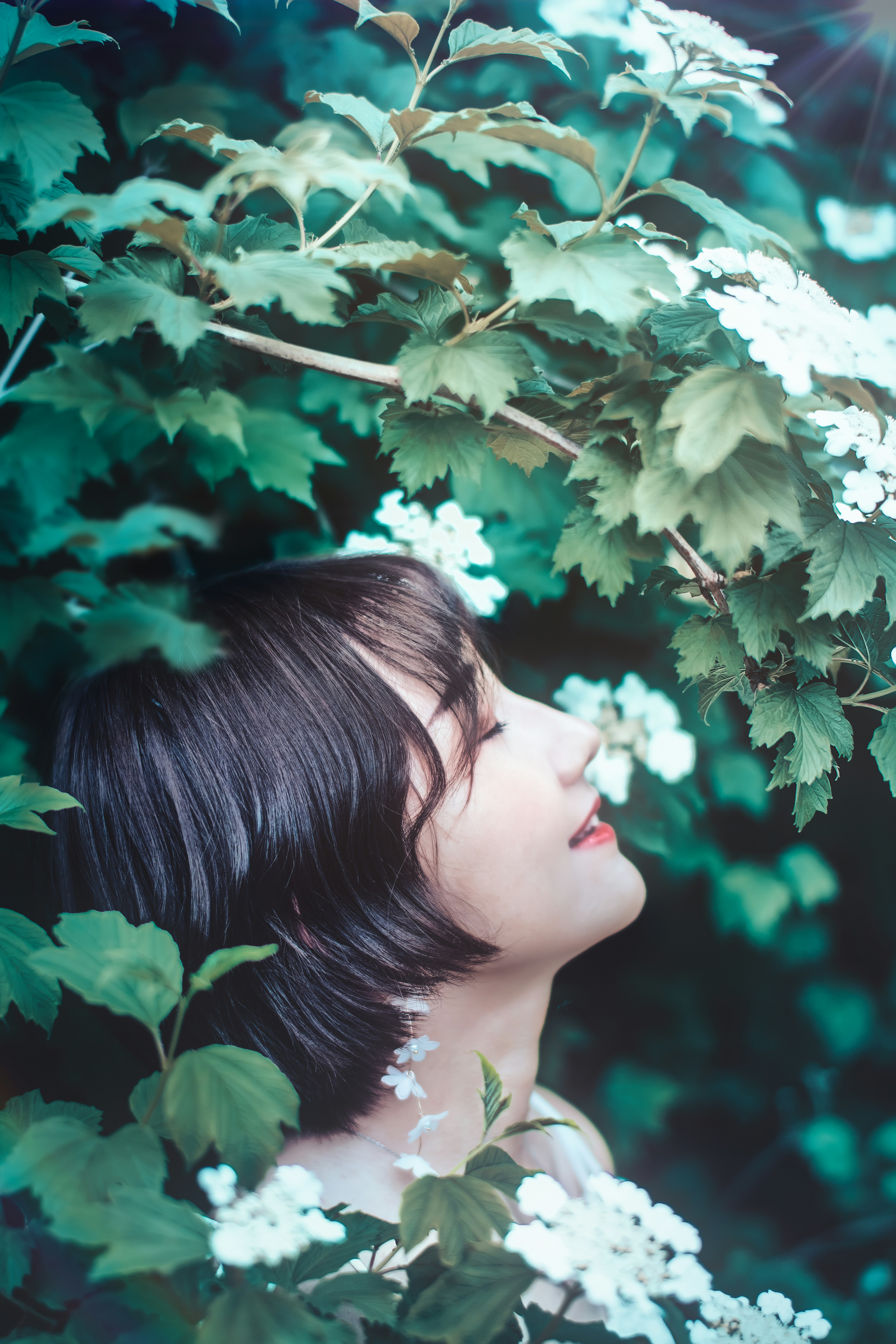 selective focus photography of woman face