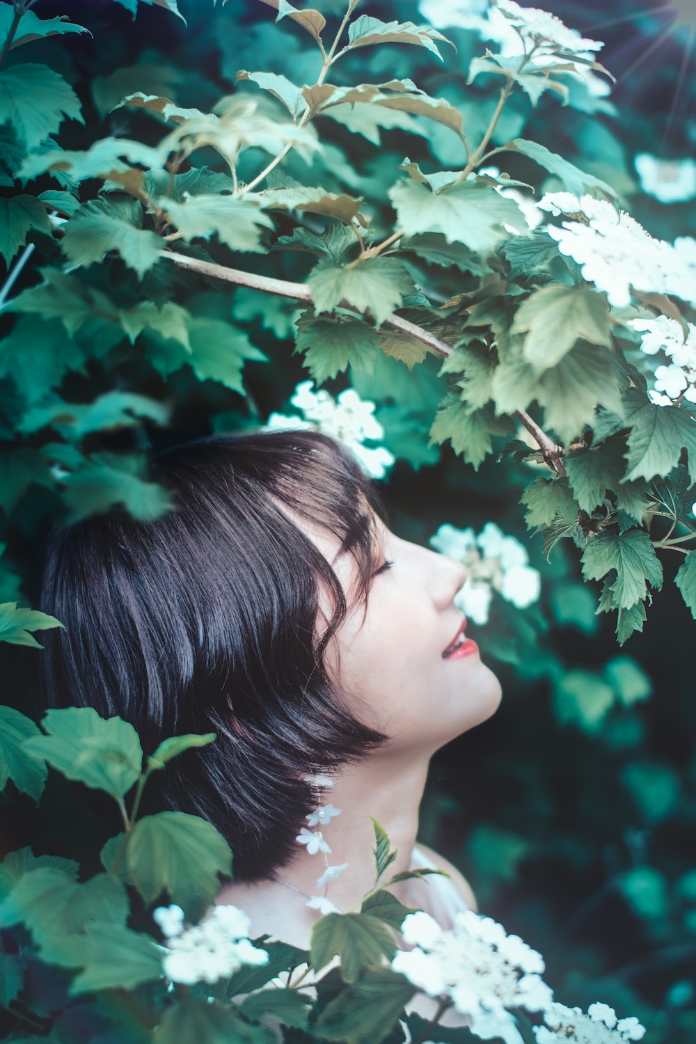 selective focus photography of woman face