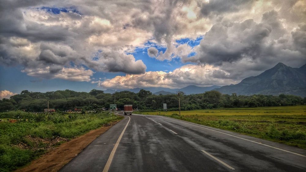 vehicle running on the road photography