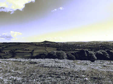 A peaceful landscape of England countryside symbolizing broad community reach.