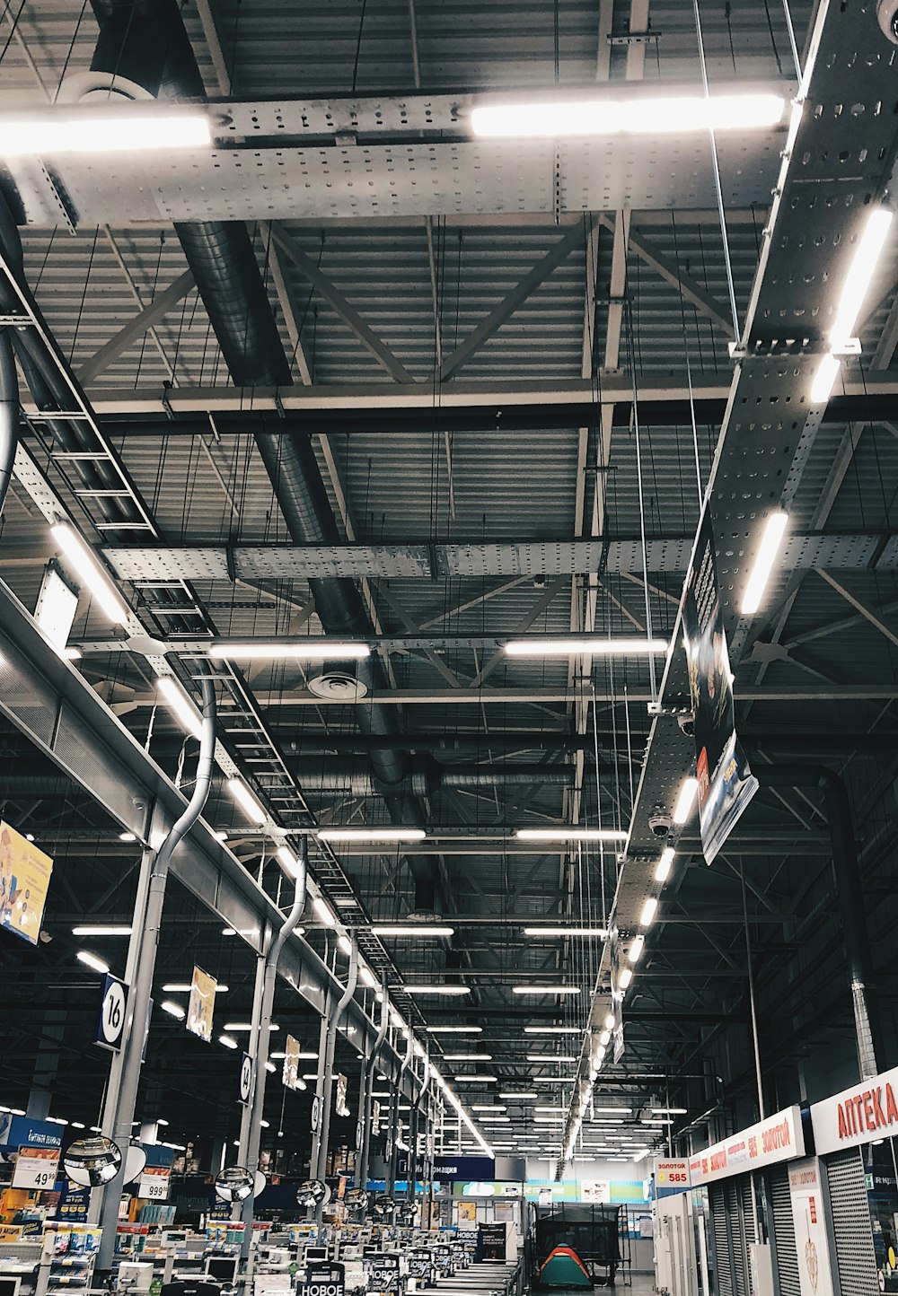 a warehouse filled with lots of machines and equipment