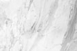 a close up of a white marble wall