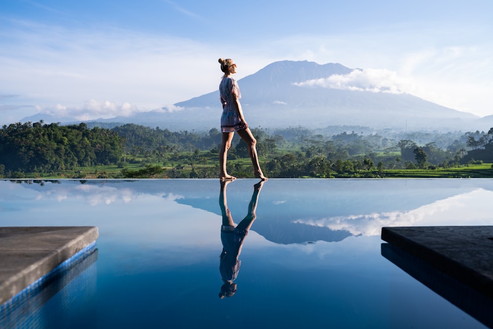 woman walking near the pool