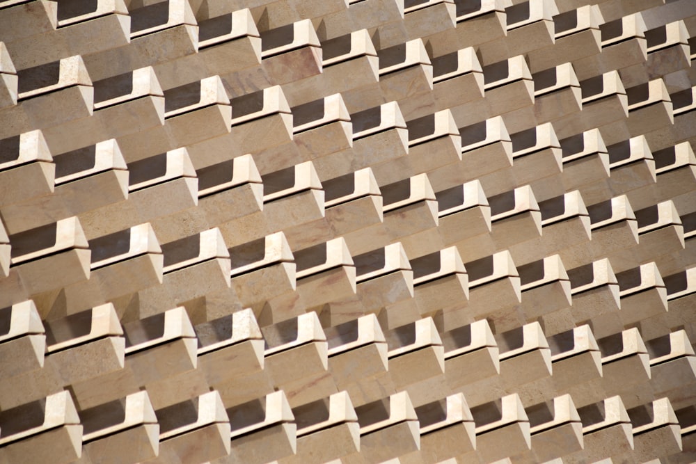 a close up of a wall made of wooden blocks