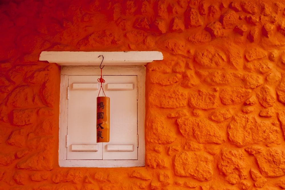 white and orange lantern