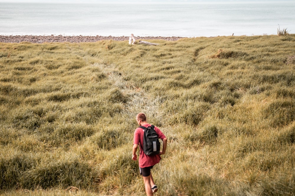 man wearing black backpack