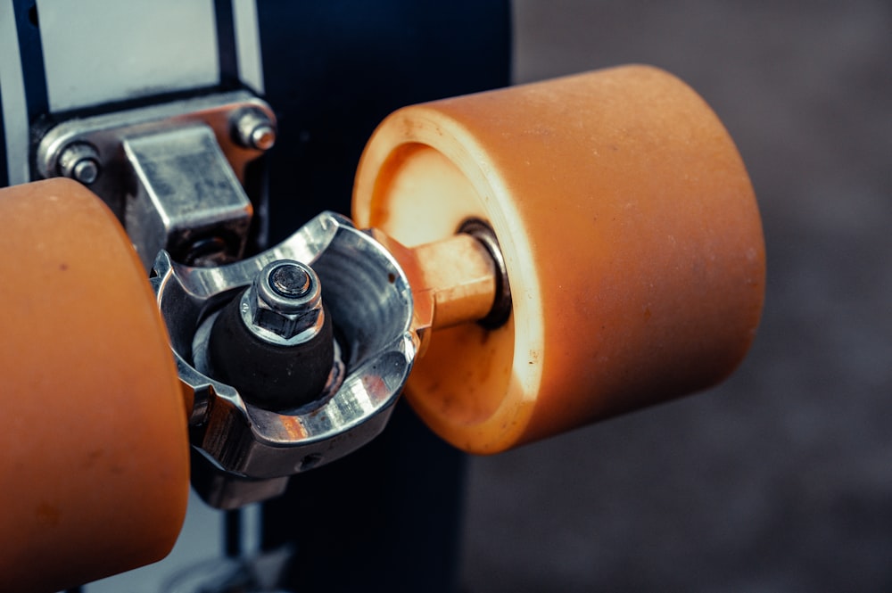 selective focus photography of brown skate wheels