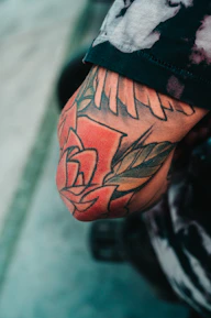 Close-up of vibrant color tattoo inked on client's arm.
