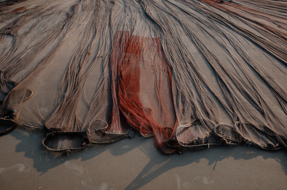 brown and red fishing nets