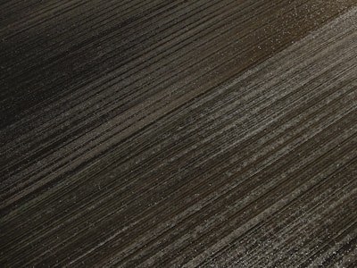 Aerial view of a freshly plowed field ready for planting.