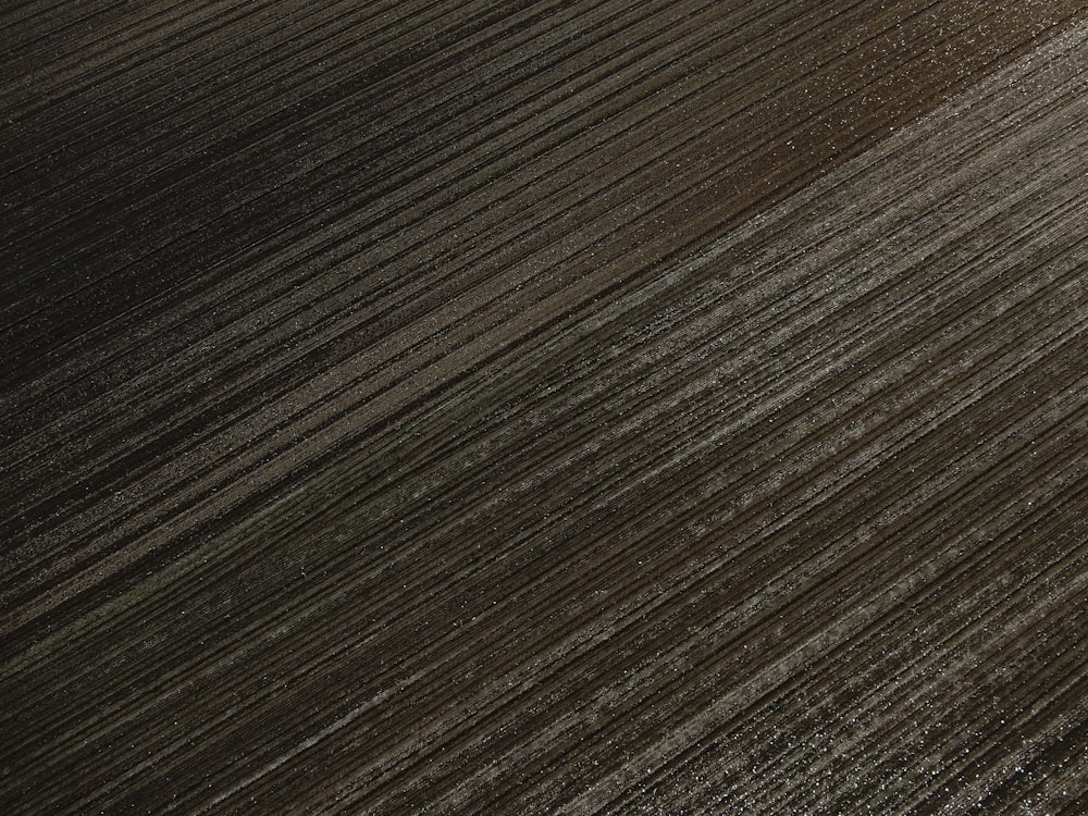 an aerial view of a plowed field