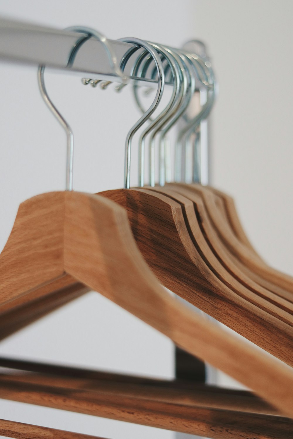 brown wooden clothes hangers