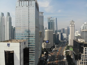 road between buildings at daytime