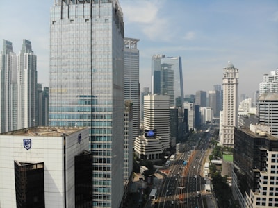 road between buildings at daytime