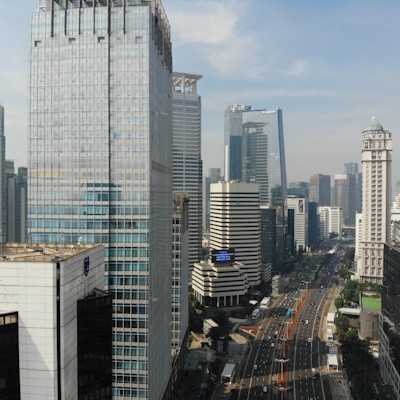 road between buildings at daytime