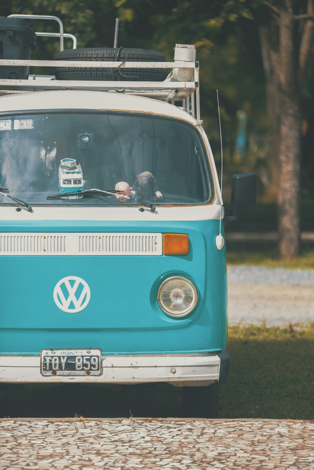 teal and silver Volkswagen van