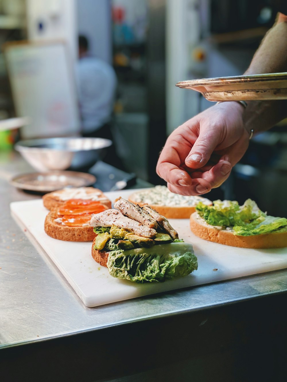 person making burger