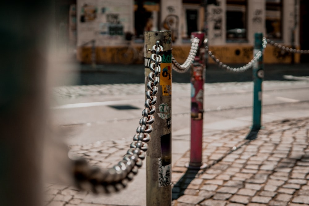 gray metal chain beside road