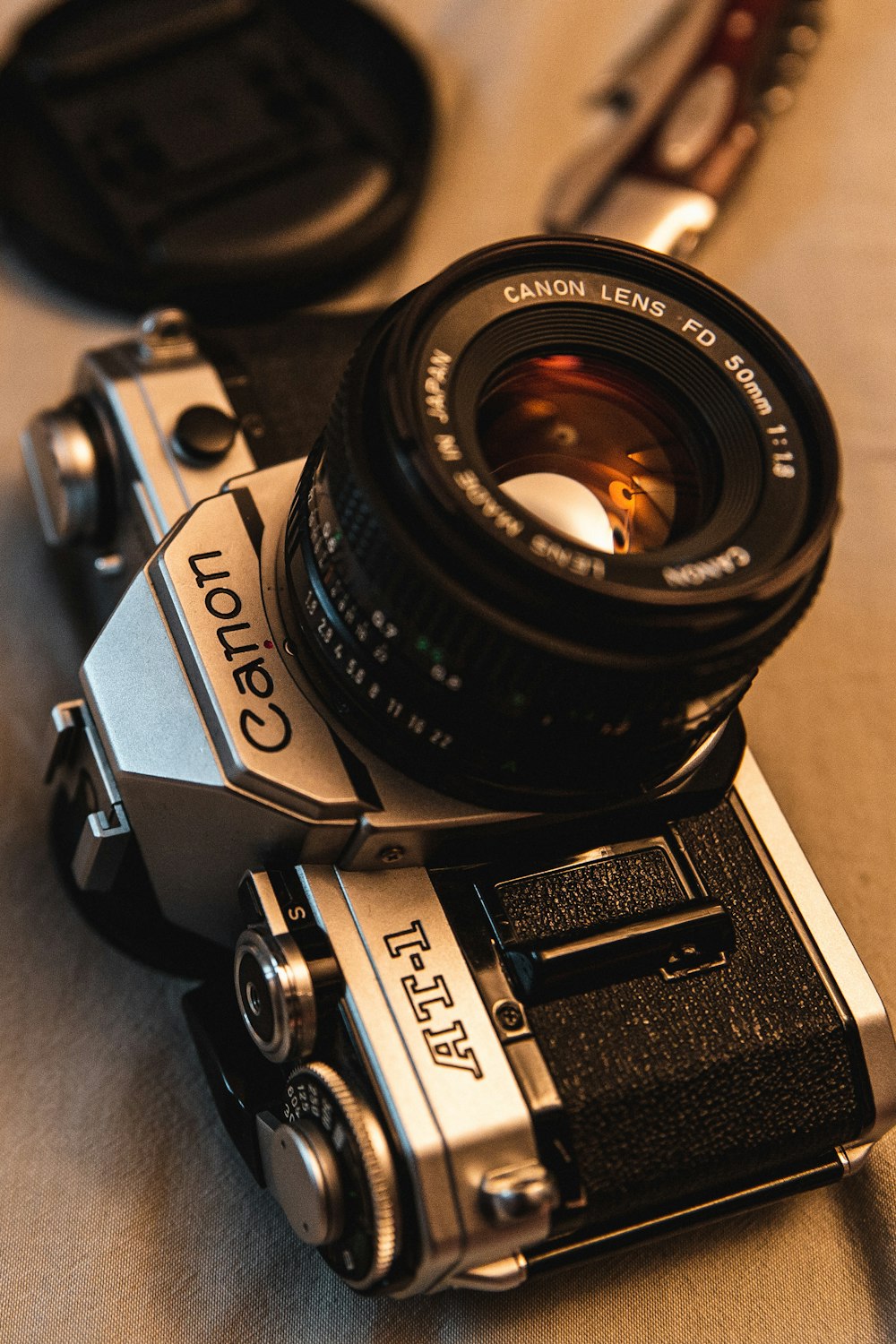 black and gray Canon DSLR camera
