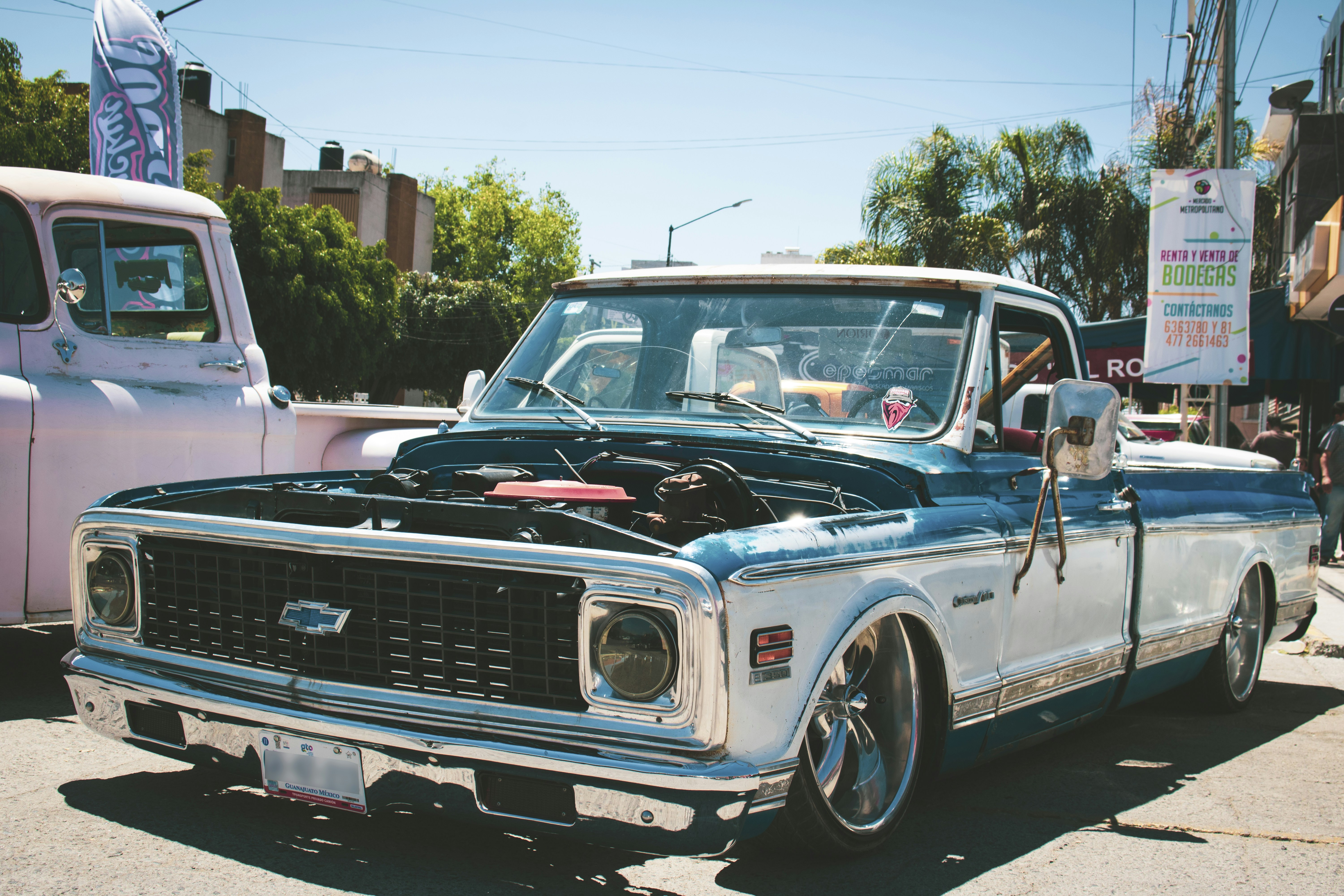 shallow focus photo of gray Chevrolet single-cab truck