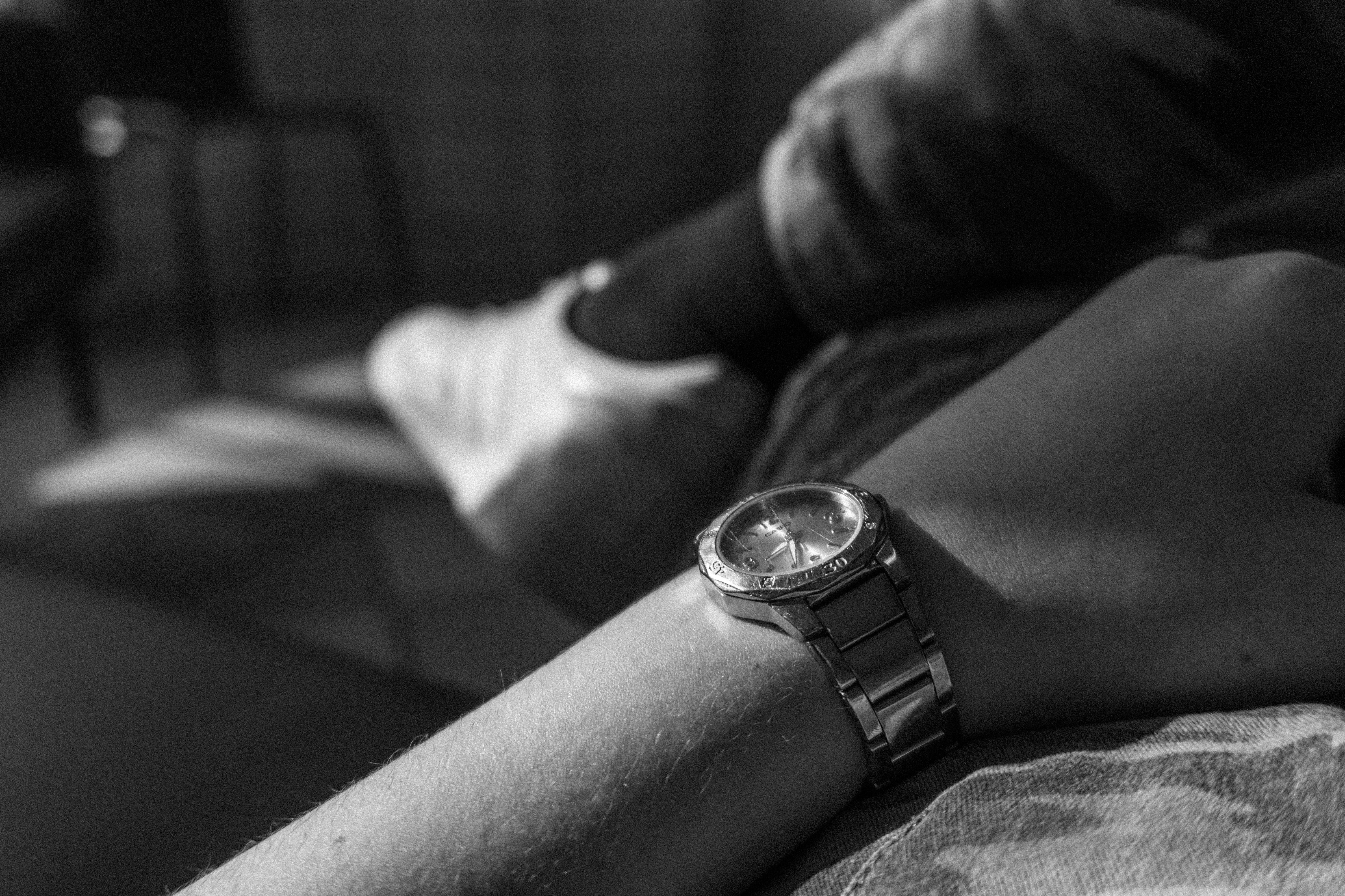 Person wearing watch photo Free Grey Image on Unsplash