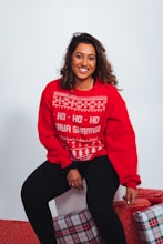 woman in red sweatshirt and black pants