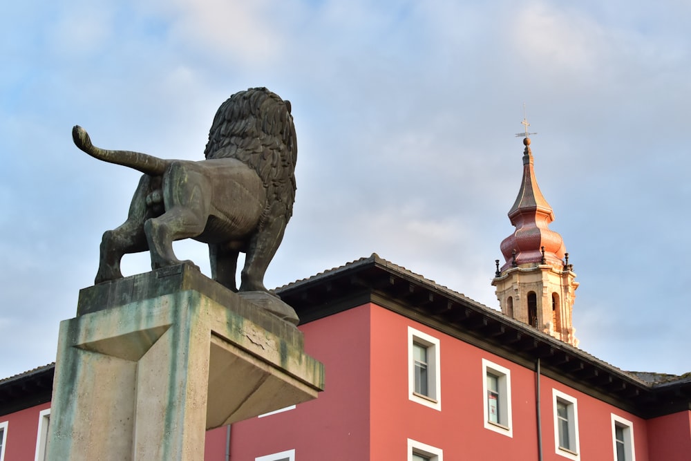 lion statue near building