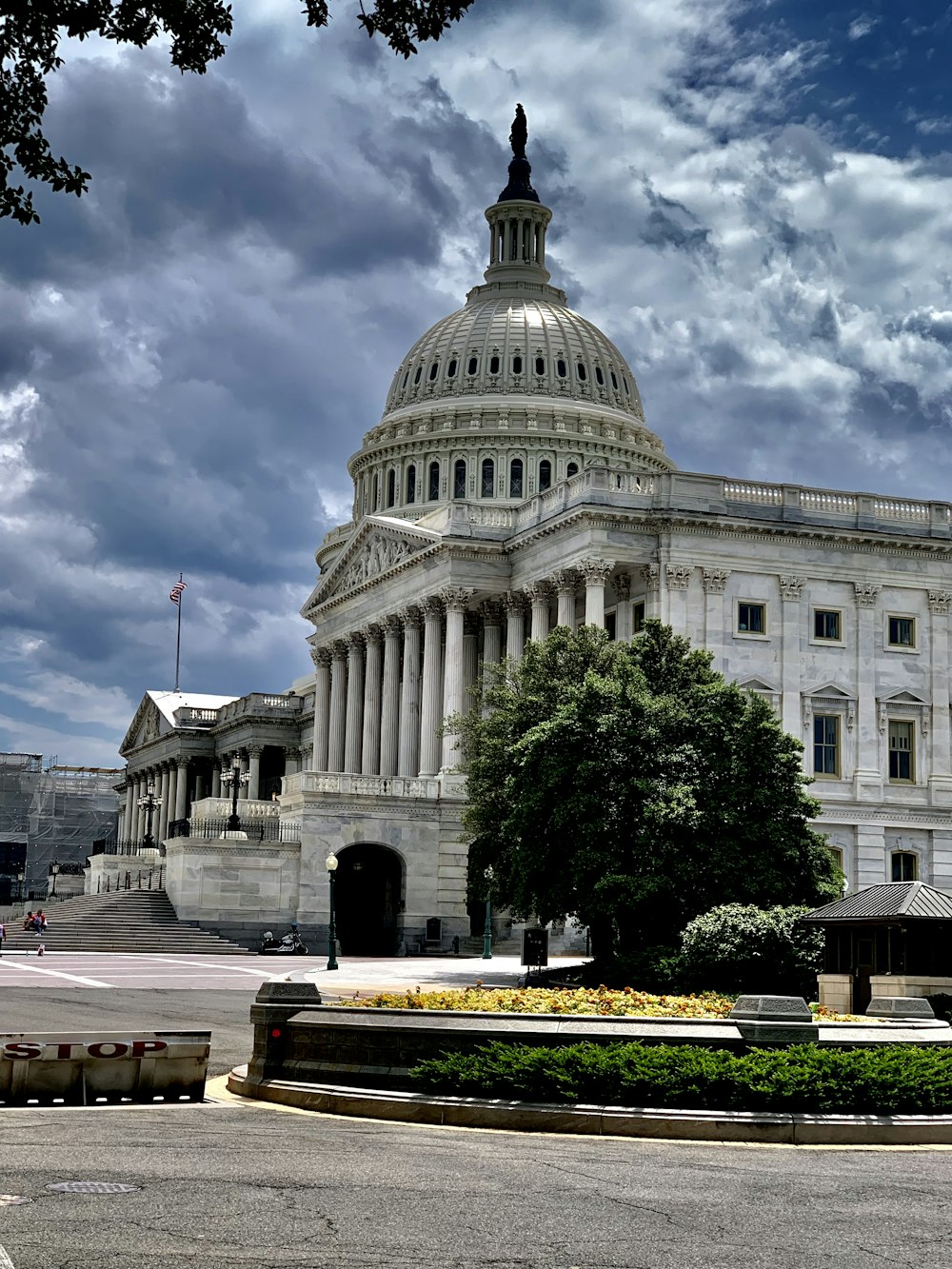 Capitol Hill during daytime under blue and white skies