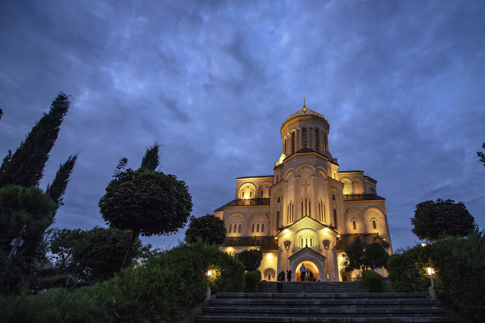 church with lights during night