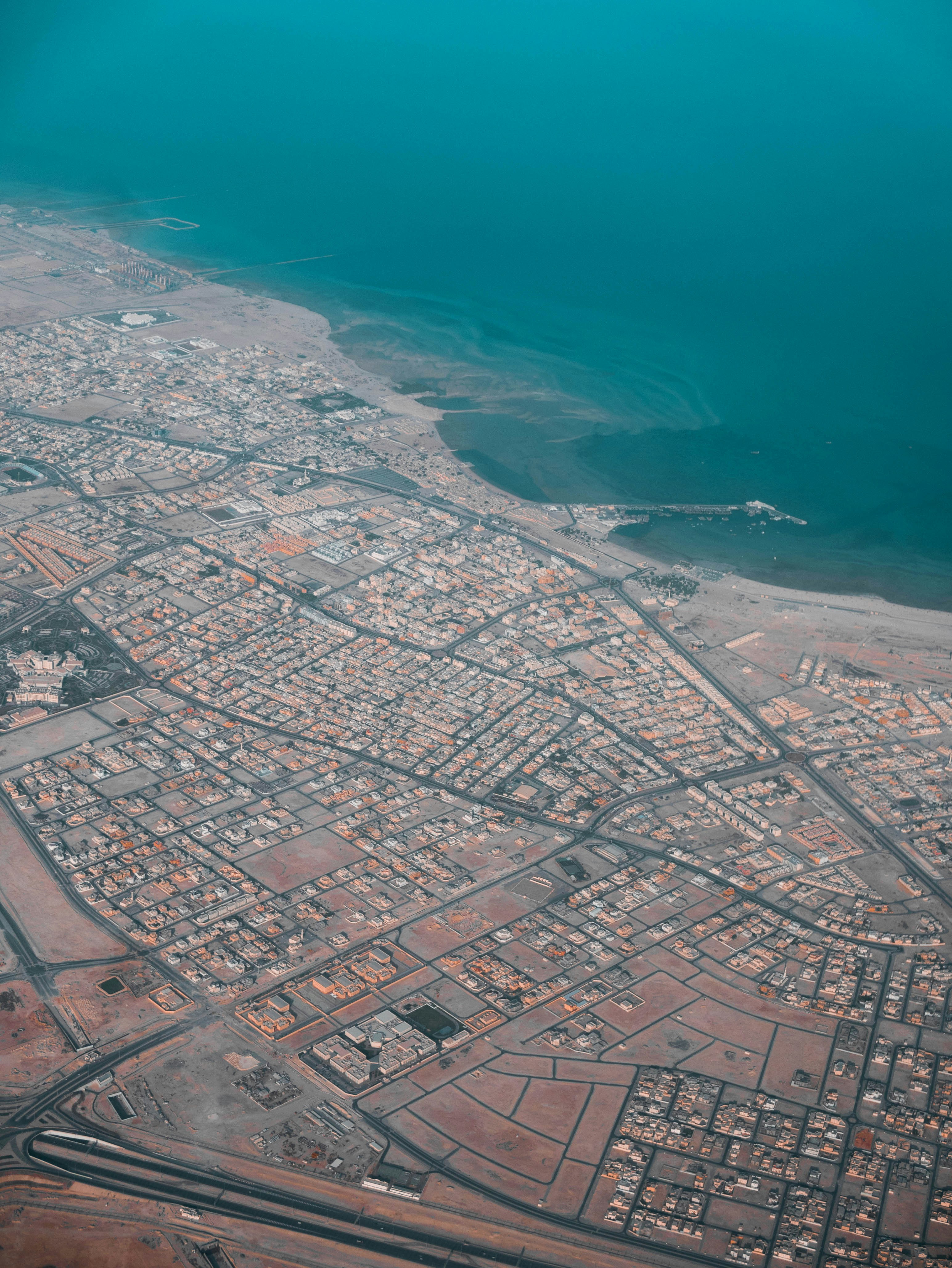 Port scene with trucks and cargo under guard