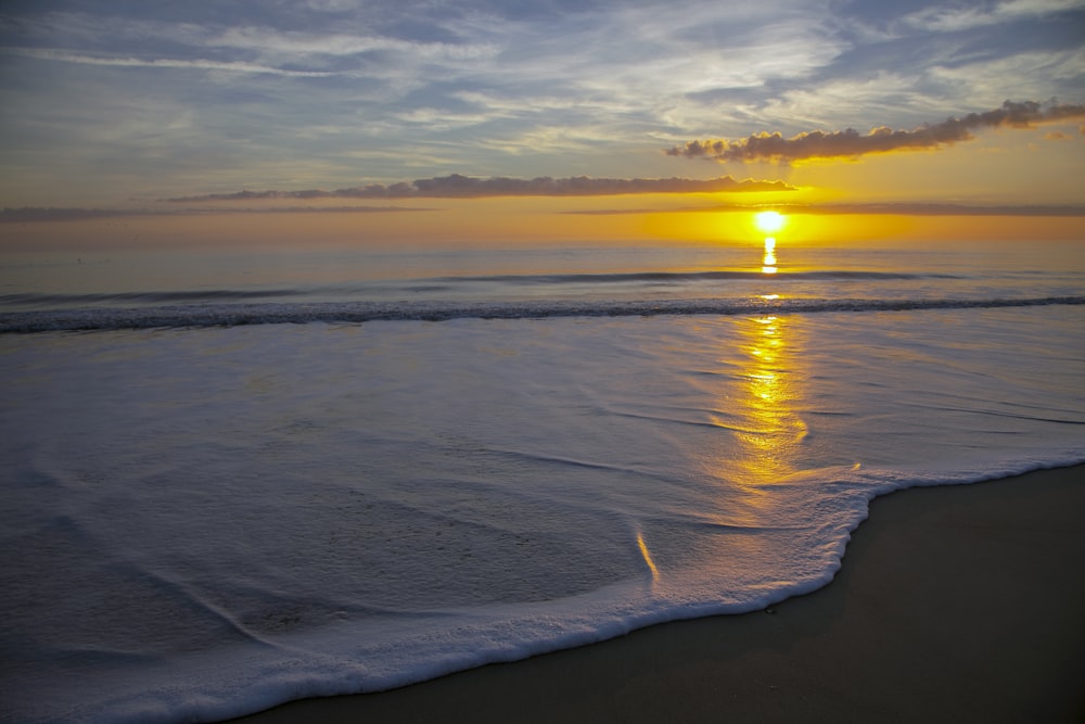 ocean waves during golden hour