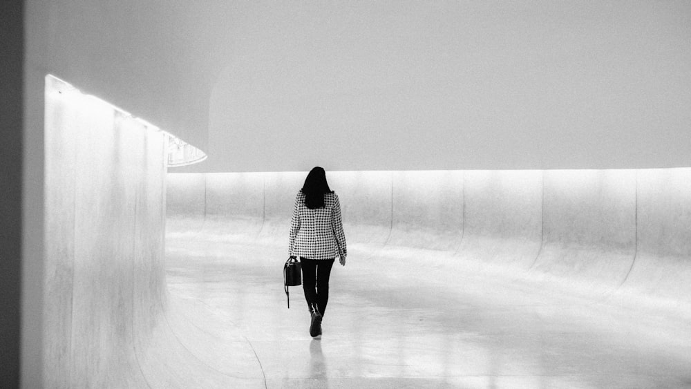 woman walking on hallway