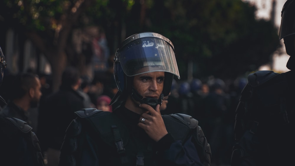 man wearing uniform and helmet