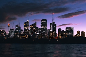 Sofia city skyline at dusk with subtle aurora light effects in the sky.